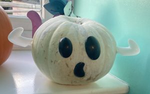 A Pumpkin painted as a ghost.